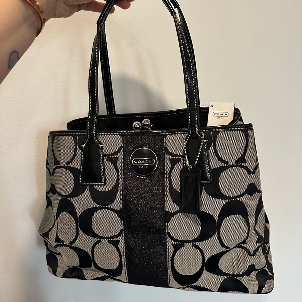 Coach purse - never used, tags still attached